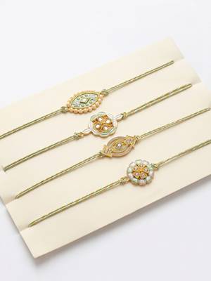 set of 4 white artificial stones & green thread rakhi with roli chawal chandan mishri 2