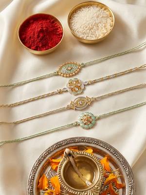 set of 4 white artificial stones & green thread rakhi with roli chawal chandan mishri 4