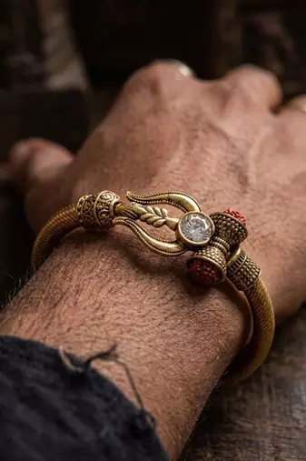 gold plated trishool design rudraksh rakhi bracelet with roli chawal chandan mishri