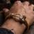 gold plated trishool design rudraksh rakhi bracelet with roli chawal chandan mishri