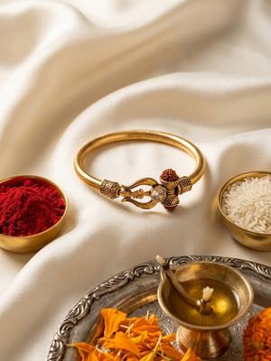 gold plated trishool design rudraksh rakhi bracelet with roli chawal chandan mishri 5