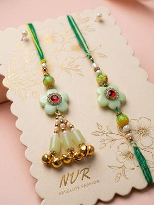 set of 2 flower shape artificial stones & beads bhaiya bhabhi rakhi with roli chawal 1