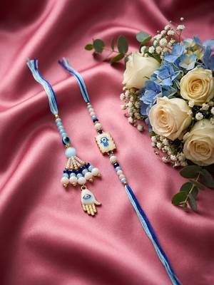 set of 2 evil eye hand design bhaiya bhabhi rakhi with roli chawal chandan mishri 2