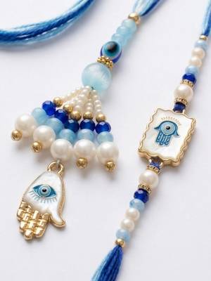 set of 2 evil eye hand design bhaiya bhabhi rakhi with roli chawal chandan mishri 3