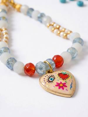 set of 2 evil eye beaded gold toned bhaiya bhabhi rakhi with roli chawal chandan 4