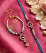 set of 2 blue evil eye gold toned beaded bhaiya bhabhi rakhi with roli chawal chandan