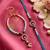 set of 2 blue evil eye gold toned beaded bhaiya bhabhi rakhi with roli chawal chandan
