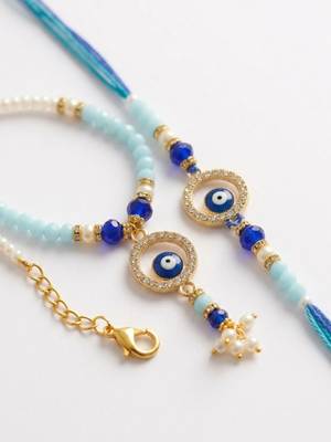 set of 2 blue evil eye gold toned beaded bhaiya bhabhi rakhi with roli chawal chandan 3