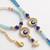 set of 2 blue evil eye gold toned beaded bhaiya bhabhi rakhi with roli chawal chandan