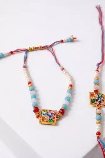 set of 2 multicolor artificial beads bhaiya bhabhi rakhi with roli chawal chandan