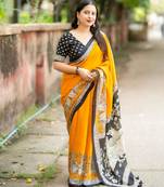 yellow art silk woven saree with floral print