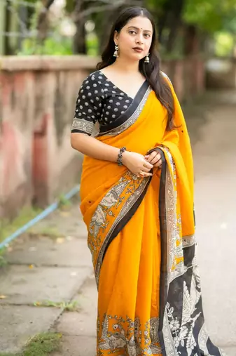 yellow art silk woven saree with floral print