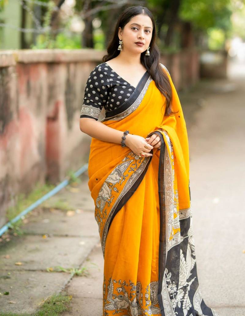 yellow art silk woven saree with floral print