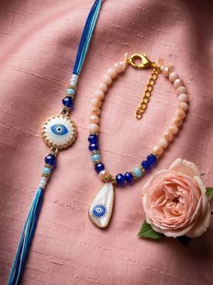 set of 2 gold toned evil eye beaded bhaiya bhabhi rakhi with roli chawal chandan 1