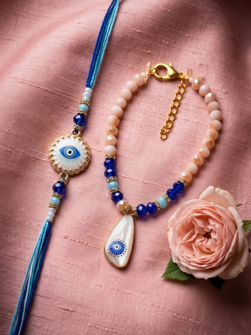 set of 2 gold toned evil eye beaded bhaiya bhabhi rakhi with roli chawal chandan