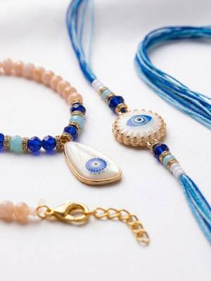 set of 2 gold toned evil eye beaded bhaiya bhabhi rakhi with roli chawal chandan 4