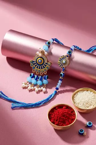 set of 2 blue evil eye artificial beads bhaiya bhabhi rakhi with roli chawal