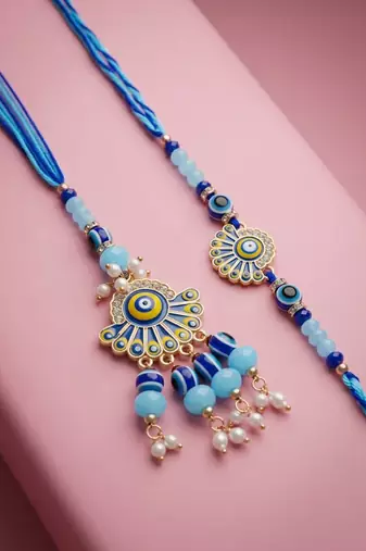 set of 2 blue evil eye artificial beads bhaiya bhabhi rakhi with roli chawal