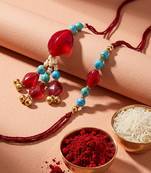 set of 2 artificial beads & gold toned ghungroo bhaiya bhabhi rakhi with roli chawal