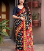 black linen printed saree with ikkat print
