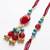 set of 2 artificial beads & gold toned ghungroo bhaiya bhabhi rakhi with roli chawal