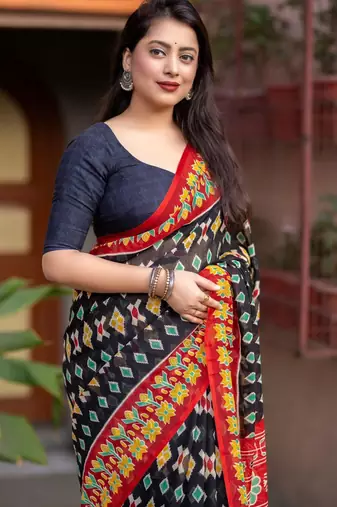 black linen printed saree with ikkat print