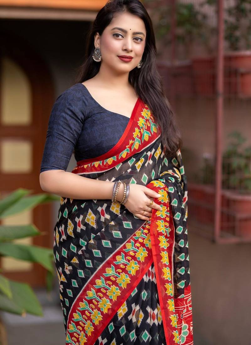 black linen printed saree with ikkat print