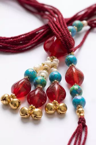 set of 2 artificial beads & gold toned ghungroo bhaiya bhabhi rakhi with roli chawal