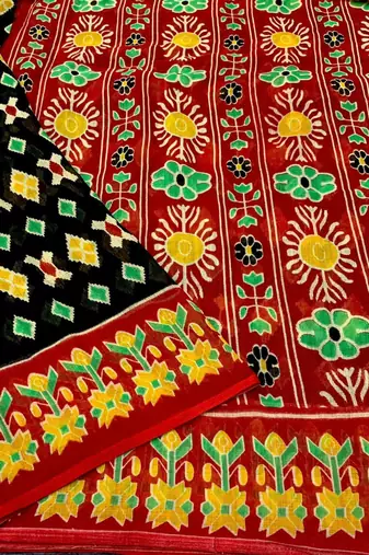 black linen printed saree with ikkat print