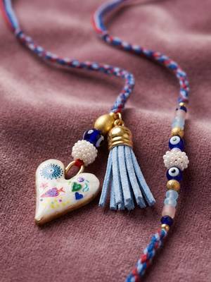 set of 2 evil eye beaded heart shape bhaiya bhabhi rakhi with roli chawal chandan 1