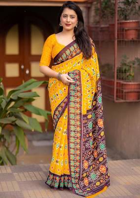 yellow linen printed saree with ikkat print 1