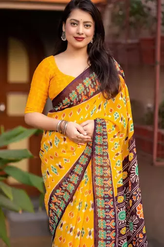 yellow linen printed saree with ikkat print