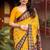 yellow linen printed saree with ikkat print