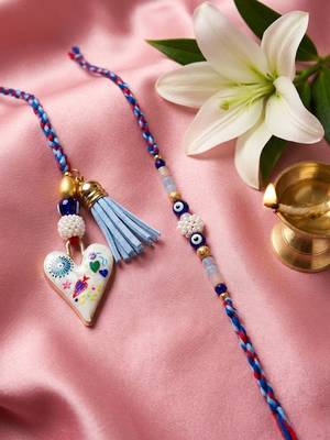 set of 2 evil eye beaded heart shape bhaiya bhabhi rakhi with roli chawal chandan 2