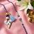 set of 2 evil eye beaded heart shape bhaiya bhabhi rakhi with roli chawal chandan