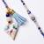 set of 2 evil eye beaded heart shape bhaiya bhabhi rakhi with roli chawal chandan