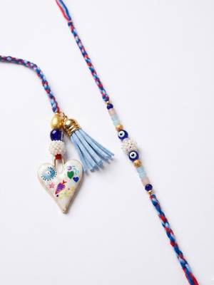 set of 2 evil eye beaded heart shape bhaiya bhabhi rakhi with roli chawal chandan 5