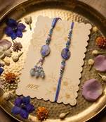 set of 2 purple artificial beads traditional bhaiya bhabhi rakhi with roli chawal
