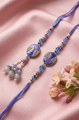 set of 2 purple artificial beads traditional bhaiya bhabhi rakhi with roli chawal