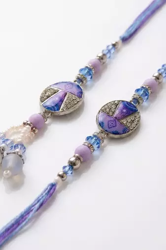 set of 2 purple artificial beads traditional bhaiya bhabhi rakhi with roli chawal