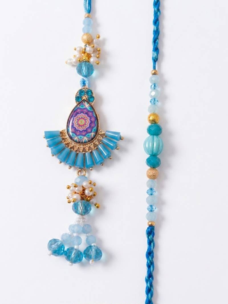 set of 2 transparent beads pear shape bhaiya bhabhi rakhi with roli chawal chandan