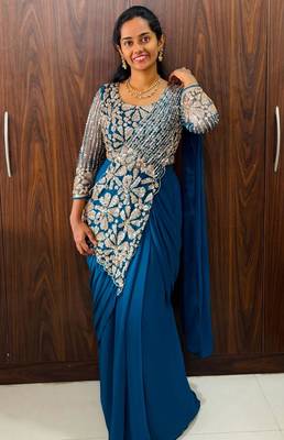 Blue georgette embroidered saree with beads 1