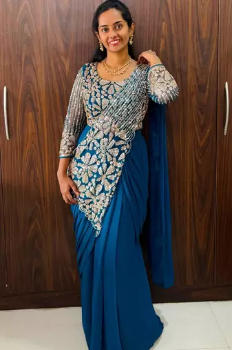 Blue georgette embroidered saree with beads