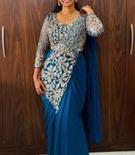Blue georgette embroidered saree with beads