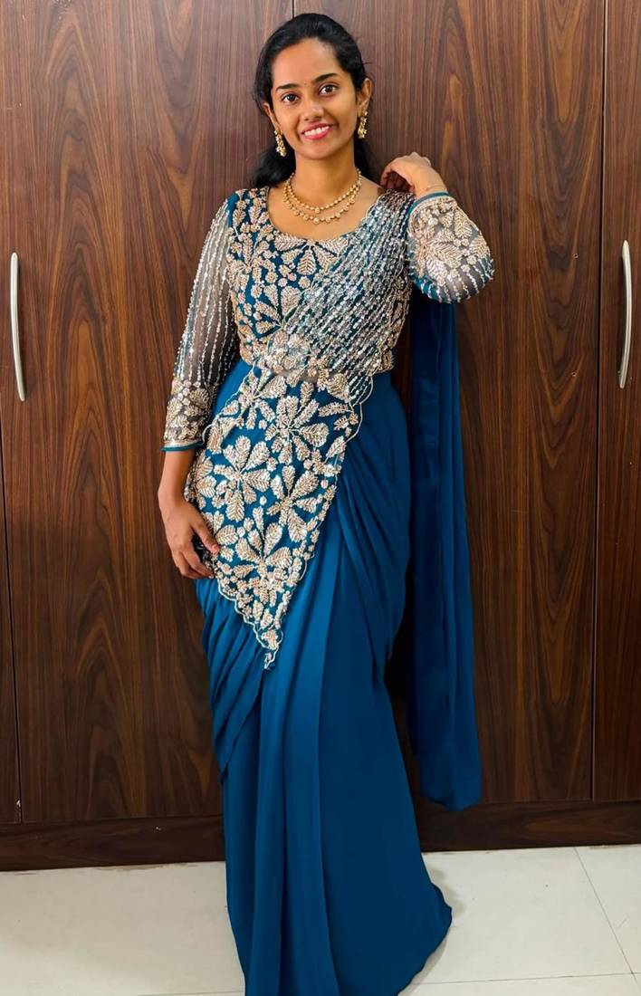 Blue georgette embroidered saree with beads
