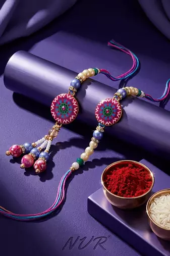 set of 2 artificial stones & beads floral design bhaiya bhabhi rakhi with roli chawal
