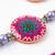 set of 2 artificial stones & beads floral design bhaiya bhabhi rakhi with roli chawal
