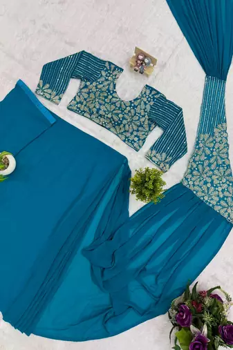 Blue georgette embroidered saree with beads