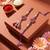 set of 2 artificial stones & beads floral design bhaiya bhabhi rakhi with roli chawal