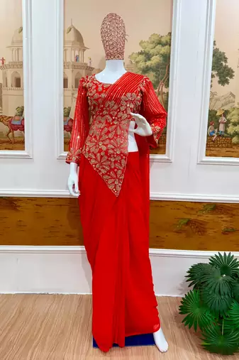Orange georgette embroidered saree with beads